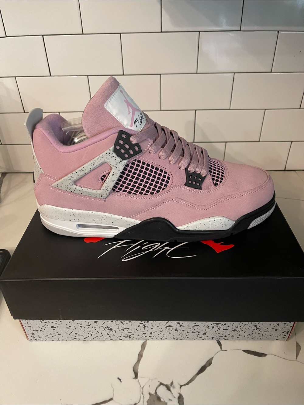 Men’s Retro 4 Pink Orchid Size 11.5.